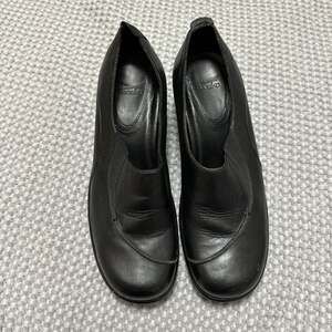 Dansko Bennett Black Nappa Leather Slip-On Wedge Heel Pumps